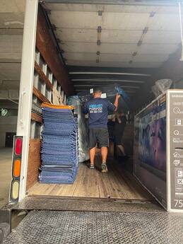 Skilled Heaven Moving Crew Packing Items Safely for Transport